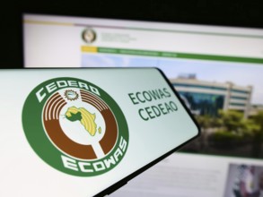 Stuttgart, Germany, 02-15-2024: Smartphone with logo of Economic Community of West African States