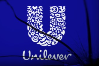 unilever logo is visible on the broken glass. Unilever PLC is a British multinational fast-moving