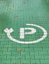 Parking space for electric cars