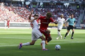 From left in a duel against #42# and Lucas Martinez Quarta during the football test match: SC