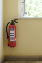 Berlin, Germany, June 23, 2024, Fire extinguisher in the stairwell of a residential building,