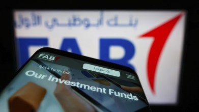 Stuttgart, Germany, 02-11-2022: Smartphone with webpage of financial company First Abu Dhabi Bank