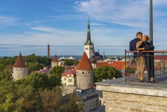A couple in the old town of Tallinn, Estonia, Europe