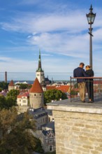 A couple in the old town of Tallinn, Estonia, Europe