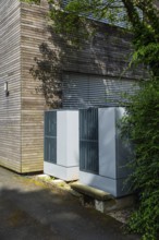 Two heat pumps in front of a house in Düsseldorf, Germany, Europe