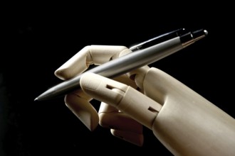 Mannequin wood hand with stainless steel pen to write, sign