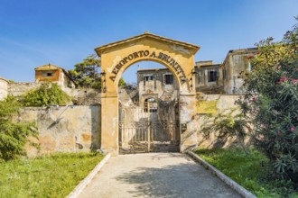 Only this gate remains as a reminder of Italy's most important seaplane airport in front of the