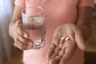 Woman accepts medicine