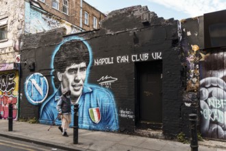 London, UK, August 25, 2023: Street scene with people walking by Brick Lane in Shoreditch Area in