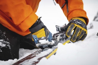 A close-up of the ski bindings as they are set up for backcountry skitouring. Sports facility