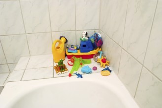 Children's toys on a bathtub
