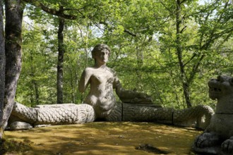 Siren and two lions, Sacro Bosco, Sacred Forest, Park of the Monsters, Parco dei Mostri, grotesque,