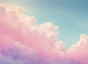 Dreamy sky with fluffy pink and white clouds against a blue background, evoking a peaceful and