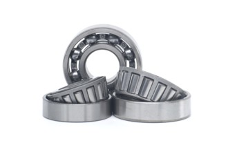 Single row tapered roller bearings and deep groove ball bearing without seal isolated on white