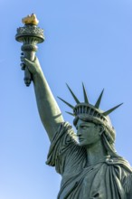 Detail replica of the Statue of Liberty by Frédéric Auguste Bartholdi at the roundabout in the Rte