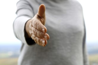 Greeting with a handshake