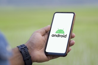 Android logo on smartphone, Android is a mobile operating system based on the Linux kernel