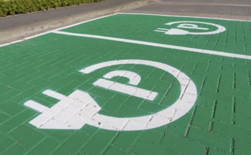 Parking place with charging symbol for electric cars