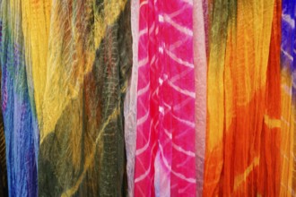 Coloured silk scarves, street market, Jaisalmer, Rajasthan, India, Asia