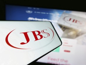 Stuttgart, Germany, 09-17-2023: Smartphone with logo of Brazilian mear processing company JBS SA on