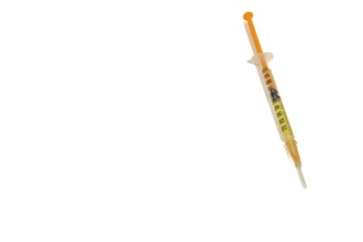 Syringe with vaccine isolated on white background and copy space