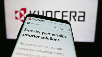 Stuttgart, Germany, 02-08-2024: Mobile phone with website of Japanese electronics company Kyocera