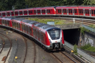 Mobility, traffic turnaround, local transport, moving Deutsche Bahn S-Bahn on the track in front of