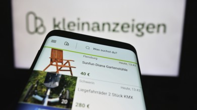 Stuttgart, Germany, 04-13-2024: Mobile phone with website of German classifieds platform company
