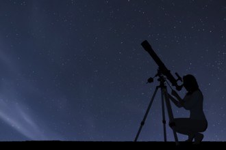 Girl looking at the stars with telescope. Starry night sky