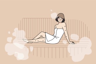 Happy young woman in towel relax in sauna enjoy bodycare procedures. Smiling girl rest in bathhouse