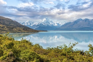 Scenic reflection of Mount Sefton and Mount Cook at lake Pukaki, South Island of New Zealand
