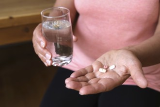 Woman accepts medicine