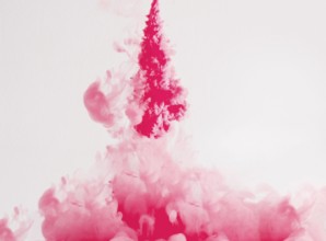 Bright ink drops dissolving underwater