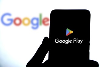 Google Play logo seen displayed on a smartphone.