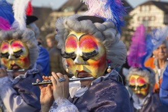 Basel, Switzerland, March 10, 2014: The tradtional carnival parade with dressed up people, Europe