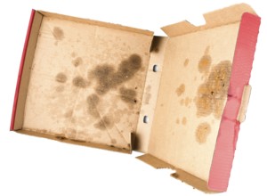 above view of greasy empty delivery pizza box
