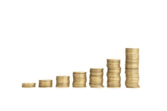 Rising Coin stacks on a white background. Growth, income, savings, investment concept. Symbol of