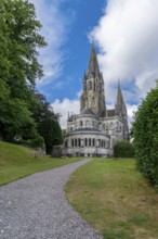 Cork, Ireland, 16 August, 2022: view of the Saint Fin Barre's Cathedral on the River Lee in