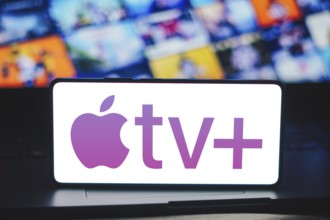 In this photo illustration, the Apple TV Plus logo is displayed on a smartphone screen