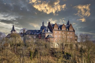 View of Rammelburg Castle near Mansfeld in the state of Saxony-Anhalt with a mystical sky