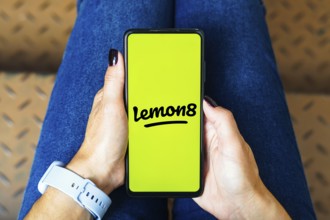 In this photo illustration, the Lemon8 logo is displayed on a smartphone screen
