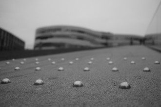 Path on the triangular meadow, accessible roof, blurred background, black and white, Düsseldorf,