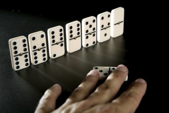 Domino game business metaphor of choosing the right way