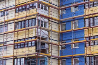 A residential building is being renovated. Insulation for energy saving and thermal insulation, A