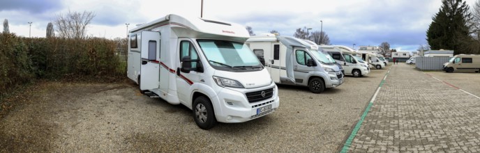 Panoramic photo with many motorhomes at the Kehl am Wasserturm car park, Kehl, Baden-Württemberg,