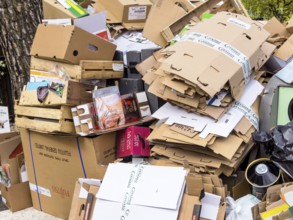 Mountains of cardboard on the street Waste paper from packaging is collected