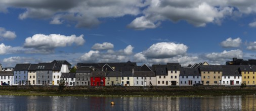Galway, Ireland, 28 July, 2022: view of the River Corrib and the Long Walk Street with its colorful