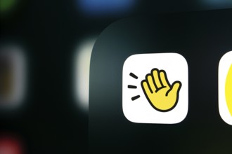 A close up of an smartphone screen displaying the clubhouse app icon.