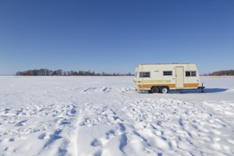 Winter, caravan trailer on the Saint Lawrence River, Province of Quebec, Canada, North America