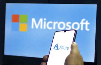 Smart phone with the Microsoft Azure logo, is a cloud service offered as a service and hosted in